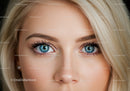 Close up of blue eyes with long lashes and blonde hair