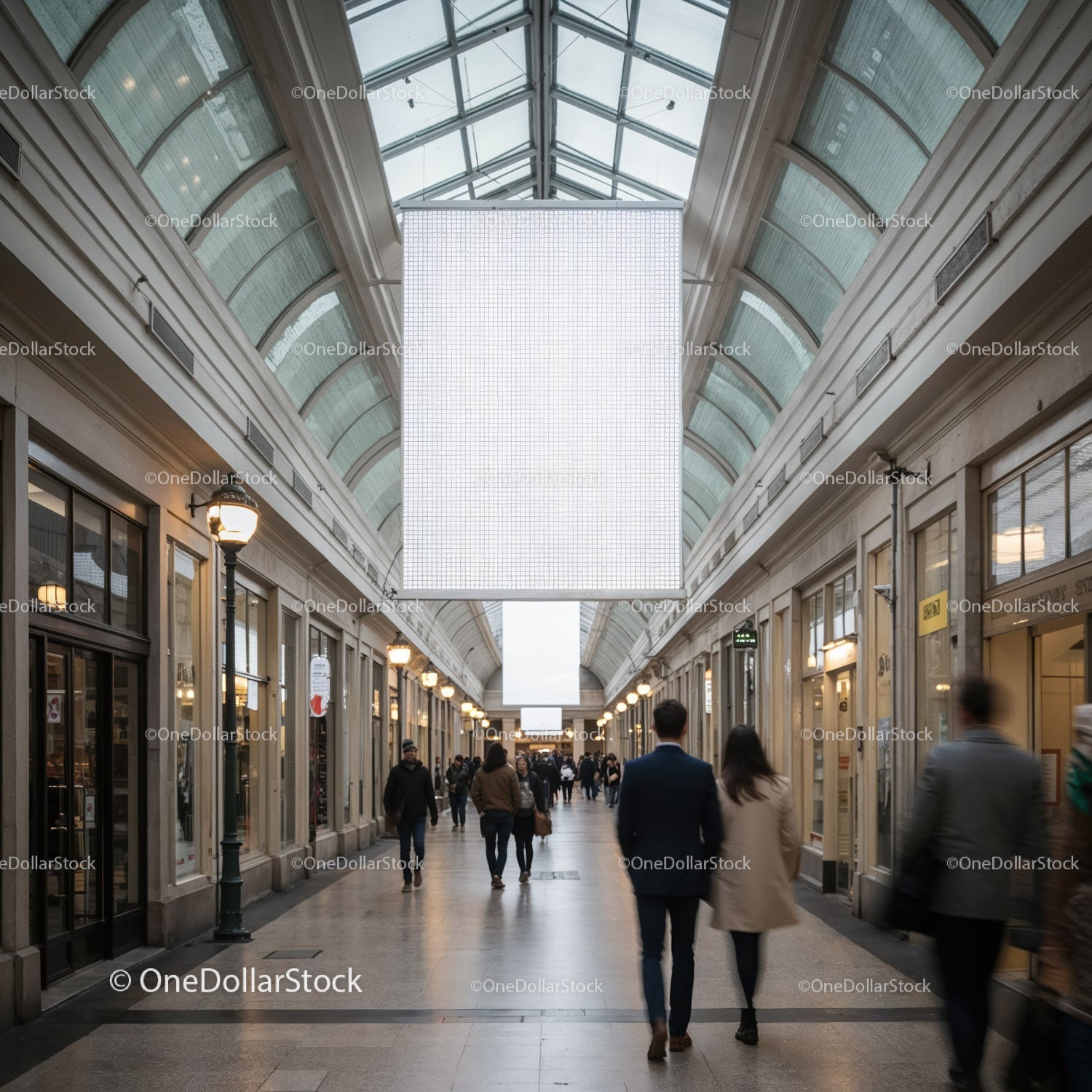 People strolling through a historic indoor shopping arcade