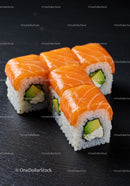 Fresh salmon sushi rolls with avocado and cream cheese