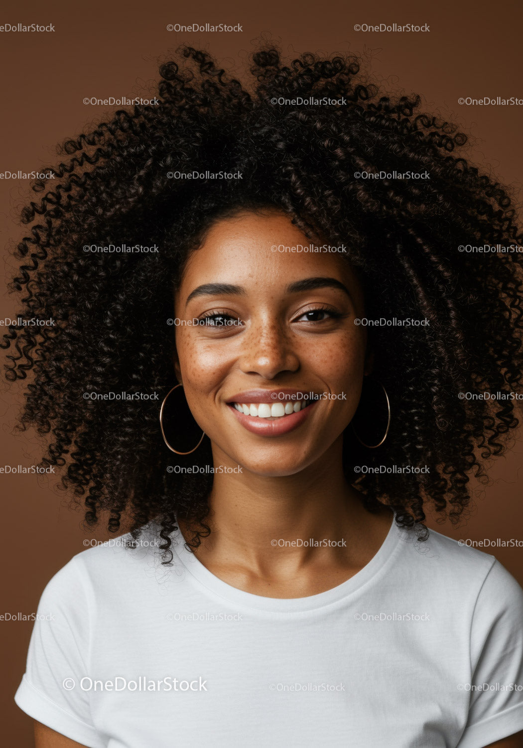 Confident Young Woman with Curly Hair Smiling Portrait