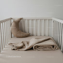 Minimalist Baby Crib with Moon Pillow and Soft Blanket