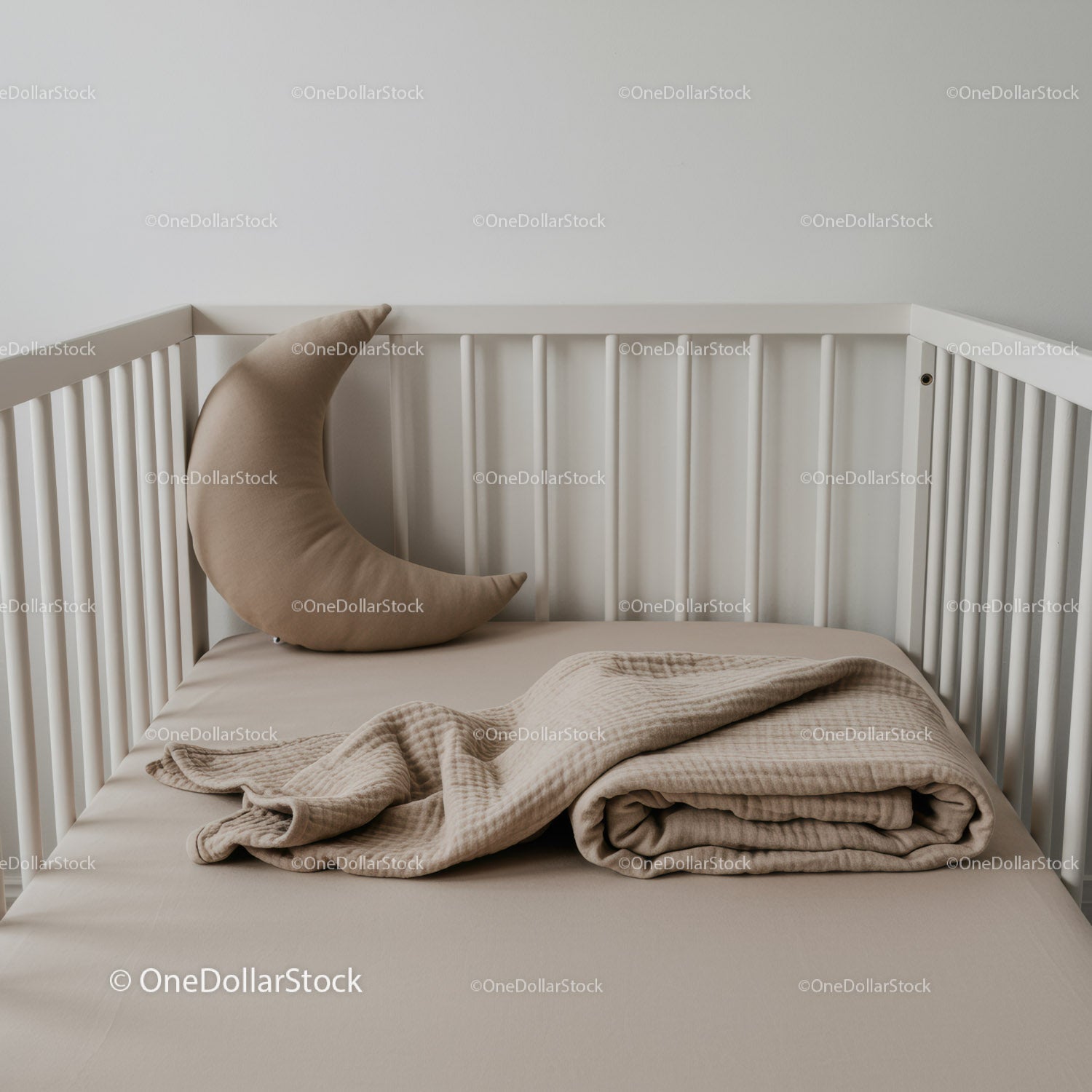 Minimalist Baby Crib with Moon Pillow and Soft Blanket