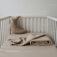 Minimalist Baby Crib with Moon Pillow and Soft Blanket