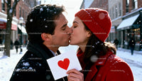 Couple Kissing Outdoors on Snowy Winter Day