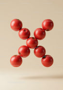 Fresh Red Tomatoes Floating on Beige Background