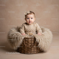 Adorable Baby Sitting in Cozy Basket with Fur Blanket