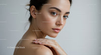 Close-Up of Elegant Woman with Clear Skin and Green Eyes