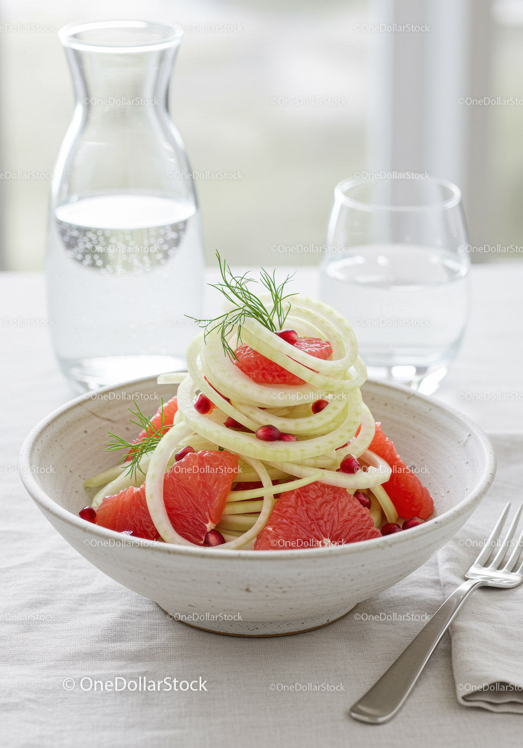 Fresh fennel and grapefruit salad with pomegranate seeds