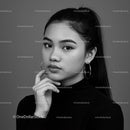 Elegant Black and White Portrait of a Fashion Model with Confident Gaze