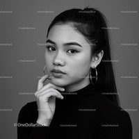 Elegant Black and White Portrait of a Fashion Model with Confident Gaze