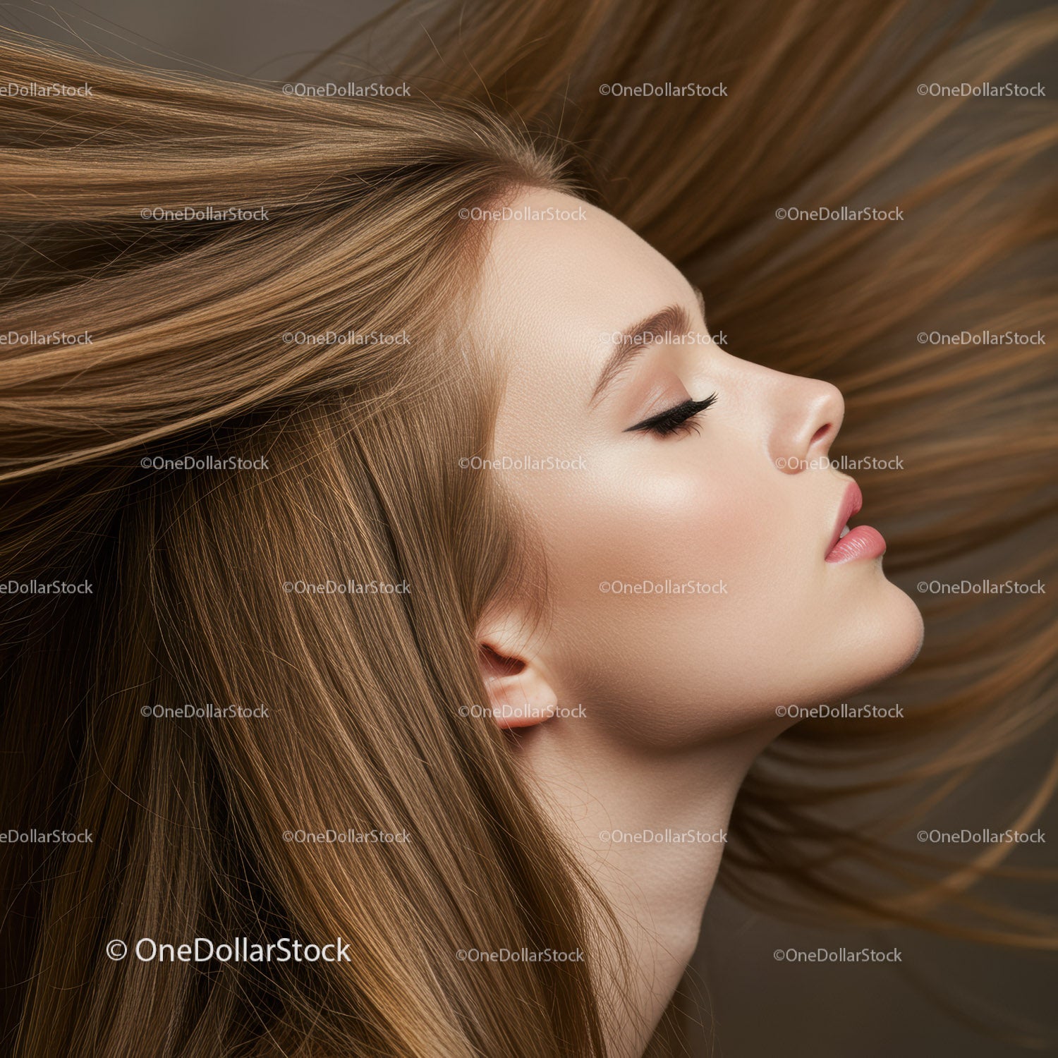 Profile of serene woman with flowing brown hair