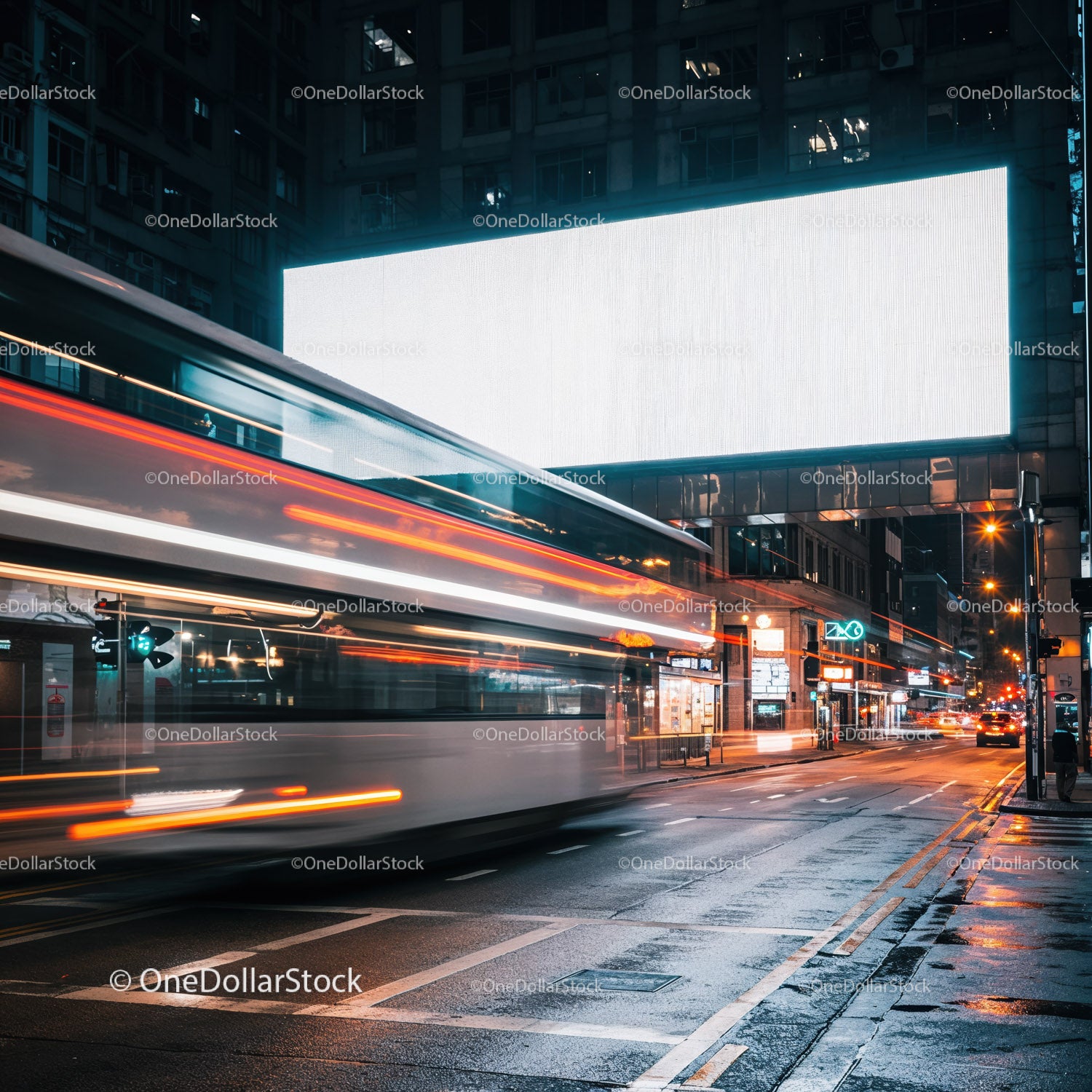 City street with light trails from passing double-decker bus