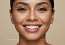 Close up of smiling woman with smooth glowing skin