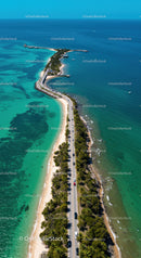 Scenic Coastal Road on Tropical Island Surrounded by Turquoise Waters
