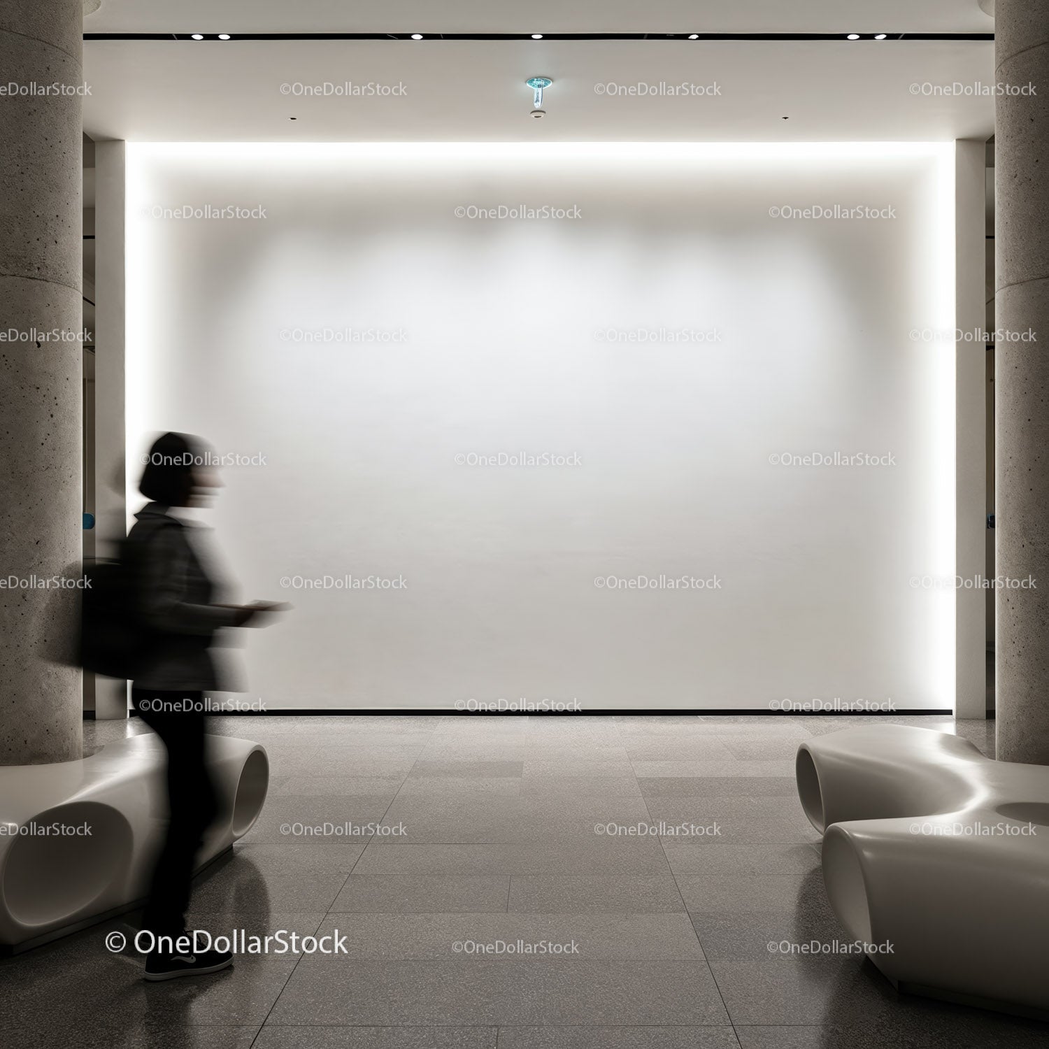 Modern gallery interior with illuminated white wall