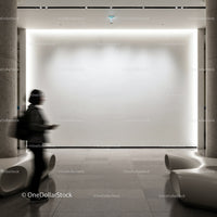 Modern gallery interior with illuminated white wall