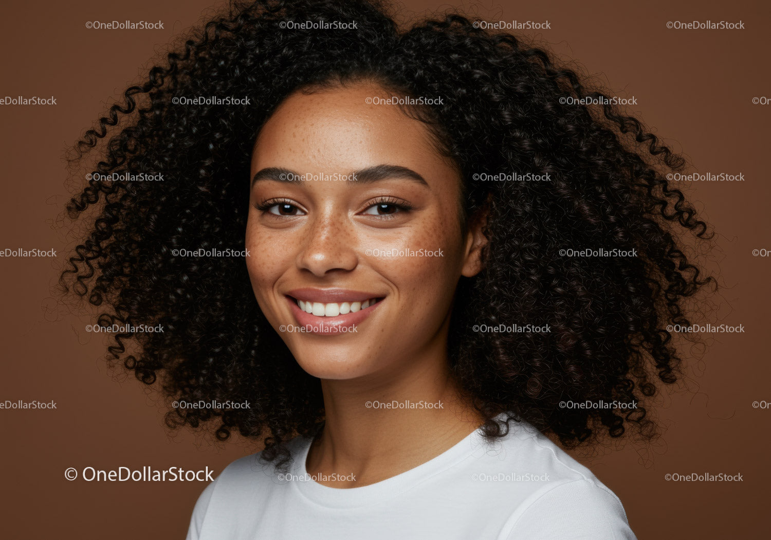 Portrait of a Happy Young Woman with Curly Hair and Bright Smile
