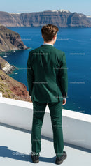 Man in Green Suit Gazing at Coastal Cliffs and Ocean
