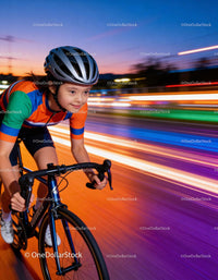 Young Girl with Down Syndrome Cycling at Sunset
