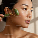 Young Woman Using Jade Roller for Skin Care and Facial Rejuvenation