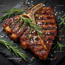 Juicy Grilled Beef Short Ribs with Rosemary on Slate Board