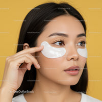 Young Woman Applying Under Eye Patches for Skincare Treatment