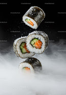 Fresh sushi rolls with cucumber and salmon on black