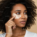 Young Woman Applying Eye Patches for Skincare Treatment