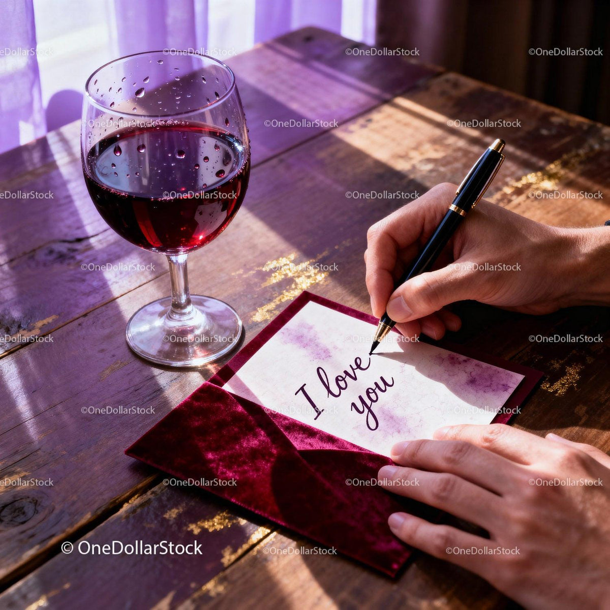 Handwriting a Romantic Love Note with Red Wine Closeup