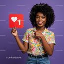 Happy Woman Holding Social Media Like Icon in Colorful Studio