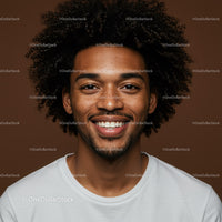 Bright Smiling Man with Curly Hair in Casual White T-Shirt