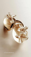 Elegant Metallic Vase and Glass Flower Decor in Modern Interior