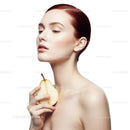 Elegant Woman with Short Hair Holding Pear in Professional Beauty Portrait