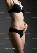 Elegant Woman in Black Underwear with Slim Toned Body and Feminine Silhouette