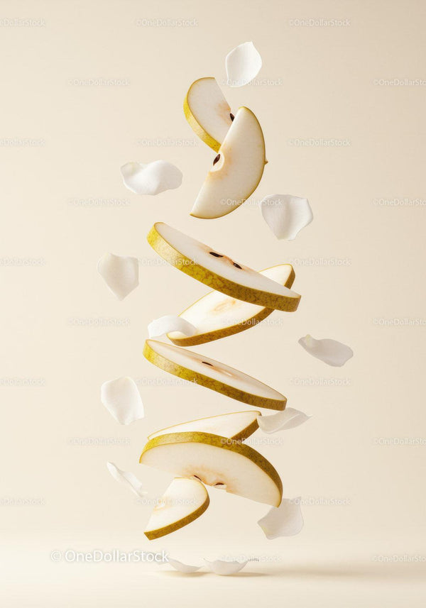 Floating Slices of Pear with Delicate White Petals