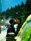 Couple Sharing a Tender Kiss in Snowy Evening