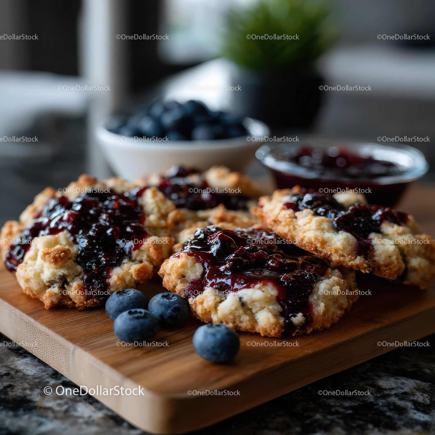 Fresh Blueberry Cookies with Berry Jam on Wooden Board