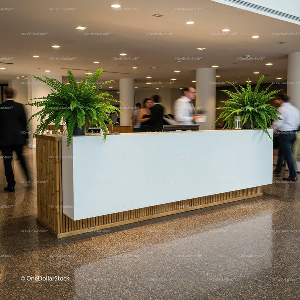Modern reception desk with green plants in office lobby JPG Mockup Image
