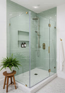 Modern Glass Shower Enclosure with Subtle Green Tiles