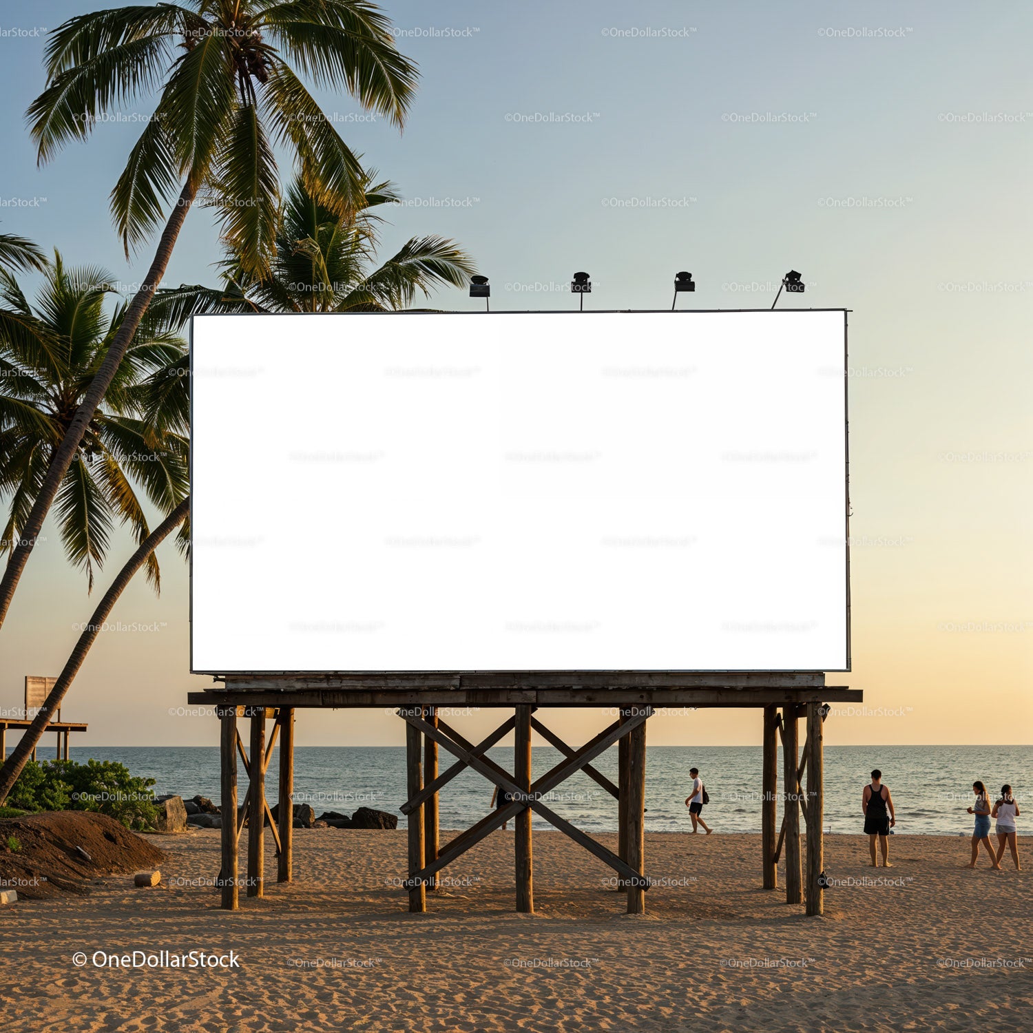 Empty billboard on tropical beach at sunset