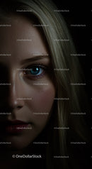 Close up of thoughtful young woman with blue eyes