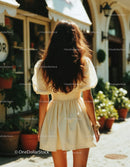 Stylish Woman in Yellow Dress Walking on Sunny City Street