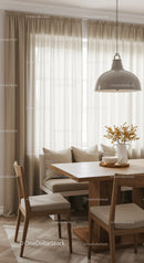 Cozy Modern Dining Room with Beige Curtains and Wooden Table