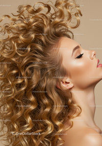 Profile of woman with voluminous curly golden hair