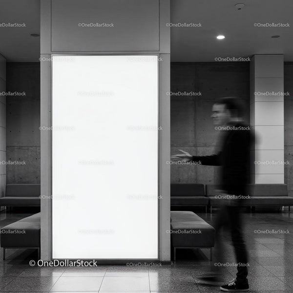 Blurred man walking past bright blank advertising panel JPG Mockup Image