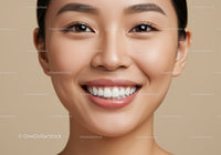 Close up of smiling young woman with smooth skin