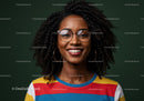 Elegant Woman with Glasses and Curly Hair in Colorful Striped Shirt
