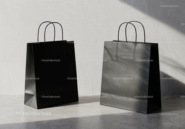 Minimalistic black shopping bags on concrete floor JPG Mockup Image