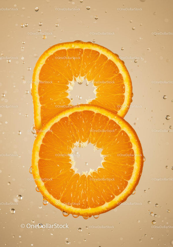 Fresh Orange Slices Floating in Sparkling Water