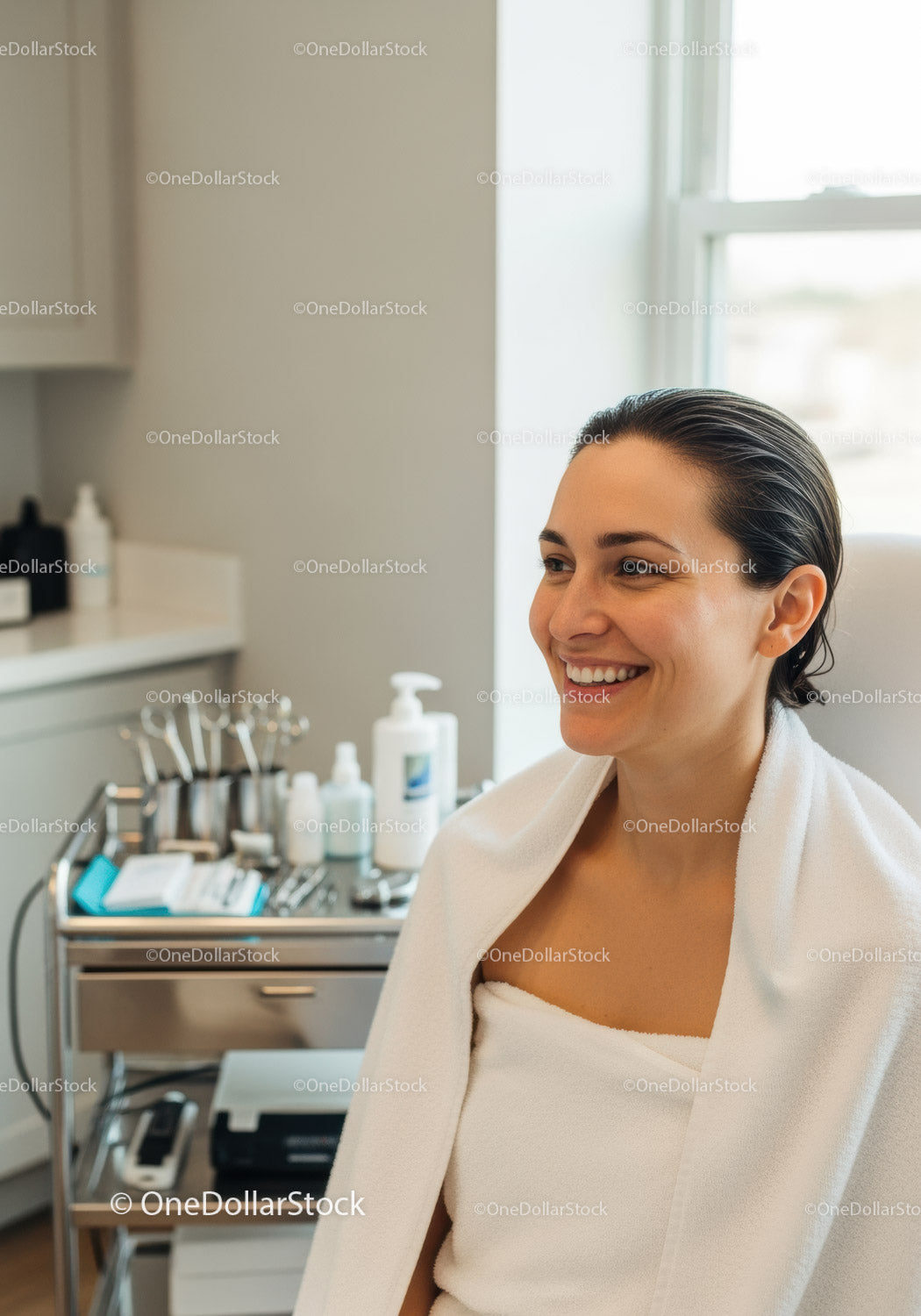 Happy Woman Receiving Skincare Treatment in Modern Spa Clinic